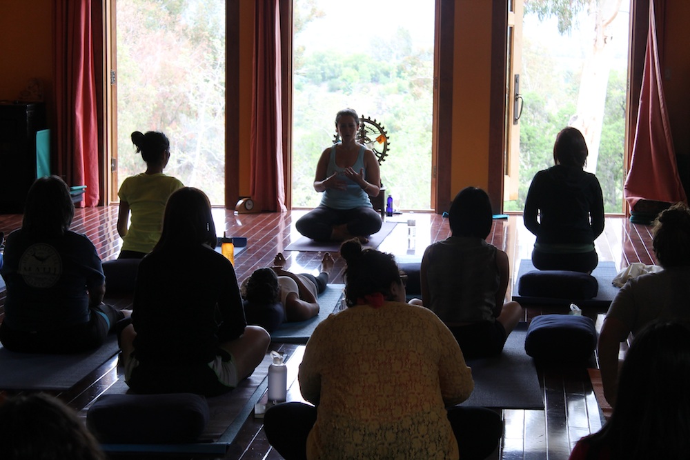 Participants doing yoga at a Joyful Heart Retreat